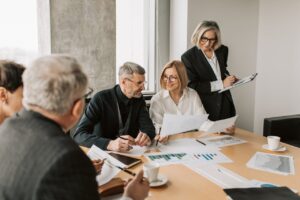 people having a meeting and discussing business rescue services